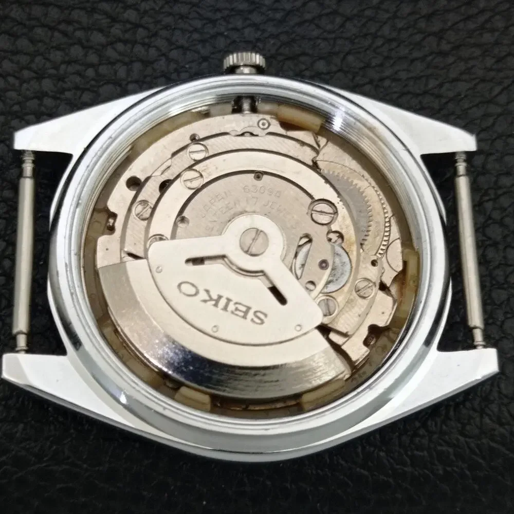 Vintage 1970 Expo Seiko Automatic Mens Silver Watch W/daydate & Red accents